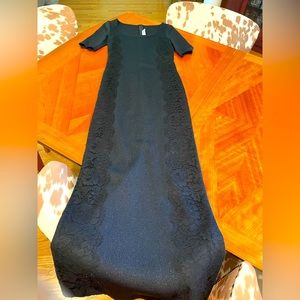 St. John Evening long black dress with embedded lace.